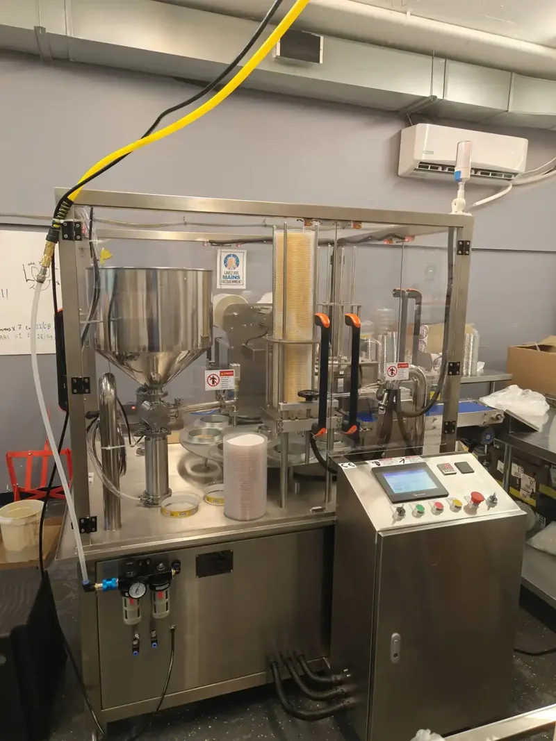 SDH-R fully automatic hummus filling machine installed in a food production facility