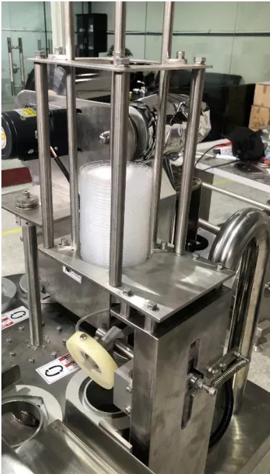 Automatic cup dispensing and stacking mechanism of the SDH-R packaging machine